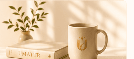UMATTR book and mug on a warm tabletop
